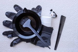 Mixing hair dye in a special plastic bowl. Concept is hair coloring. Radiant Hair Colour Cream