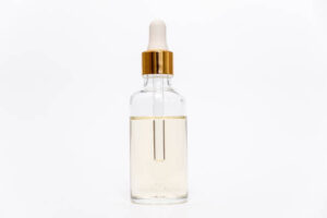 Dropper glass Bottle Mock-Up. Сosmetic pipette on white background. Glow Face Serum